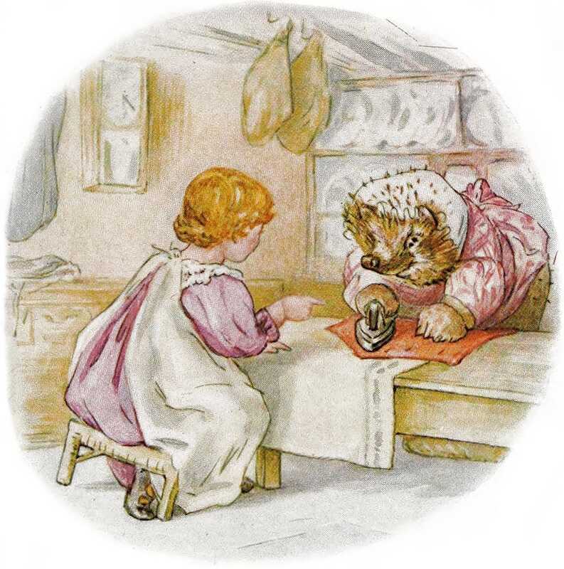 Mrs. Tiggy-winkle carefully irons Cock Robin’s red waistcoat while Lucie points at it from the other side of the table. Lucie has taken off her coat, and is wearing a pink dress with a white pinafore underneath.