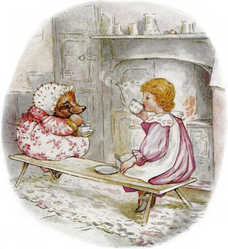 Mrs. Tiggy-winkle and Lucie sit on a wooden bench in front of the fire, each with a cup of tea. Lucie is holding a small spoon in her left hand and sipping the tea from the cup in her right.