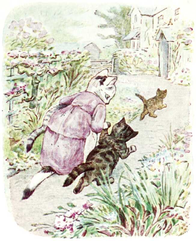 A tortoiseshell cat in a pink coat is pulling a dark brown kitten along a garden path towards a house, and carrying a light grey kitten under her other arm. In front of them runs a brown kitten. The garden is full of pink and purple flowers, and the house is large and white with a covered porch.